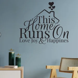 Zidna naljepnica "This home runs on Love Joy and Happines"